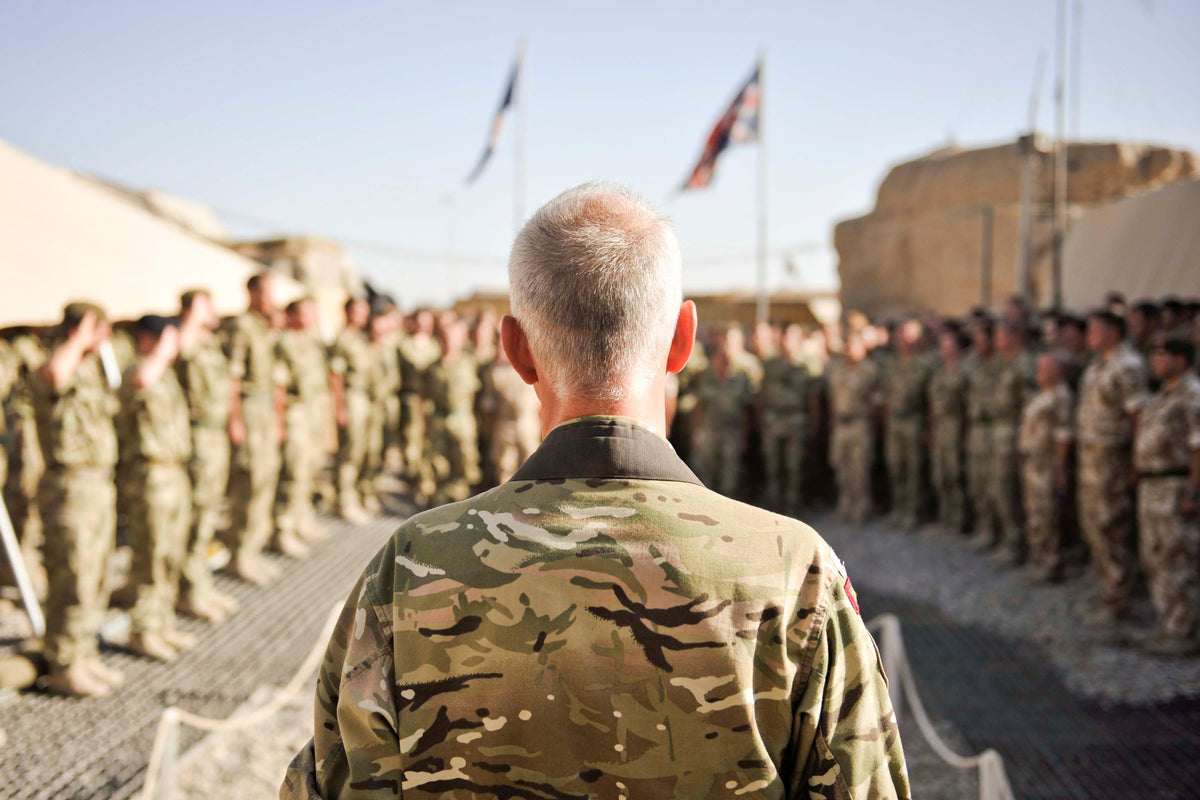 British Army memorial service in Helmand Province; remembrance context for Lance Corporal Christopher Harkett, not a portrait of him