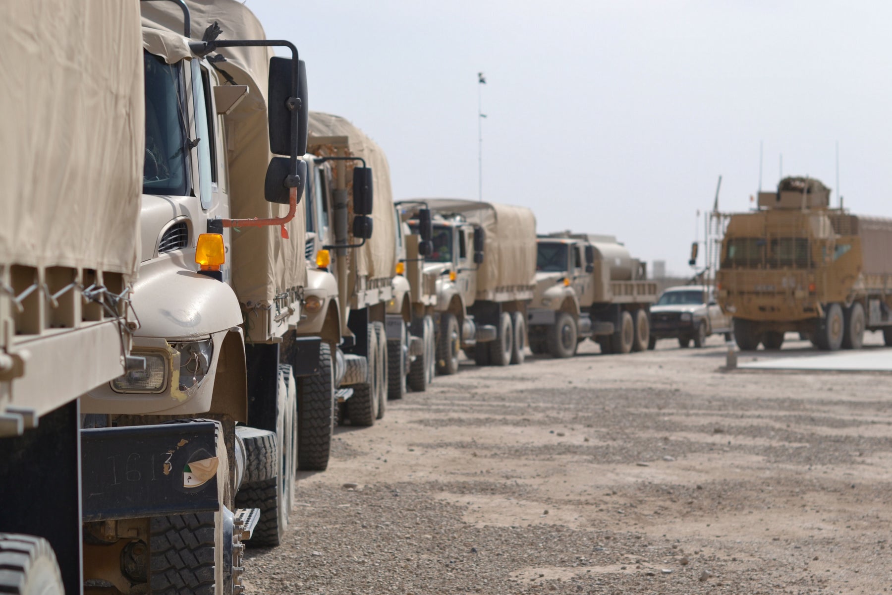 Afghan and British supply vehicles on a combat logistics patrol in Helmand during Operation HERRICK 14, May 2011