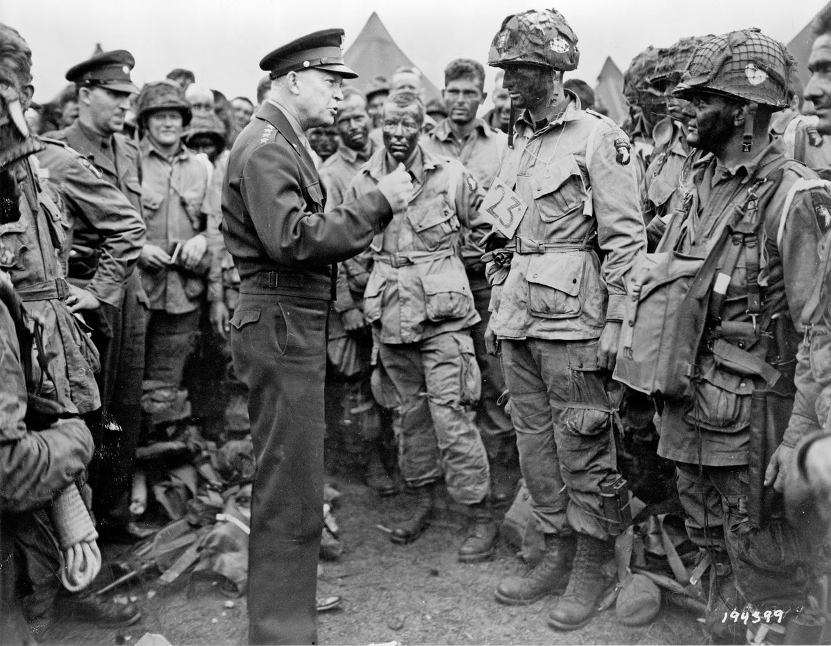 General Dwight D. Eisenhower speaking with 101st Airborne paratroopers in England before D-Day, 5 June 1944