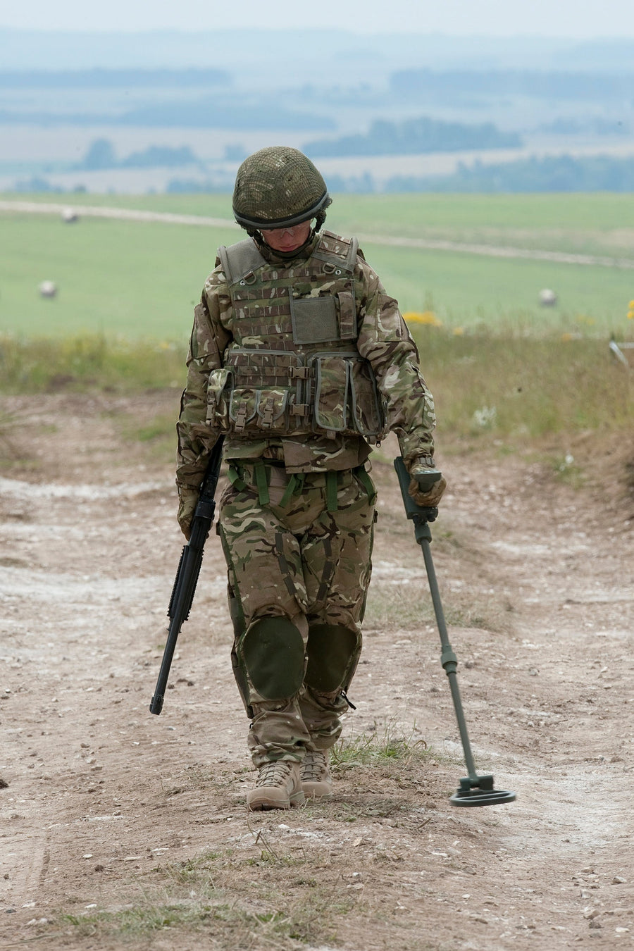 British soldier in field equipment, representing the human side of military service and support