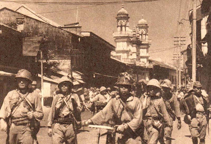 Japanese troops entering Singapore after the British surrender in February 1942