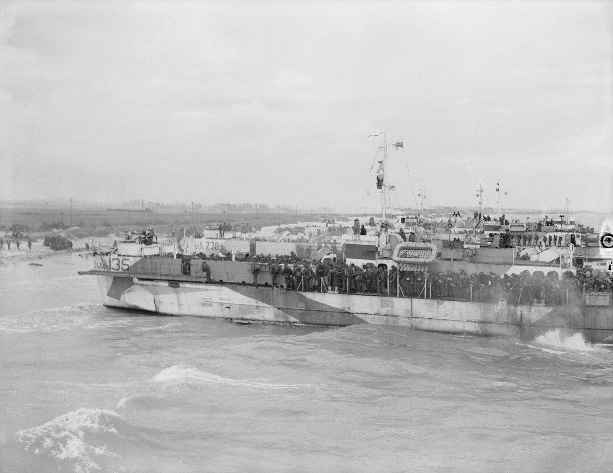 Canadian troops preparing to land at Juno Beach on D-Day, representing Gallus military history sweatshirts