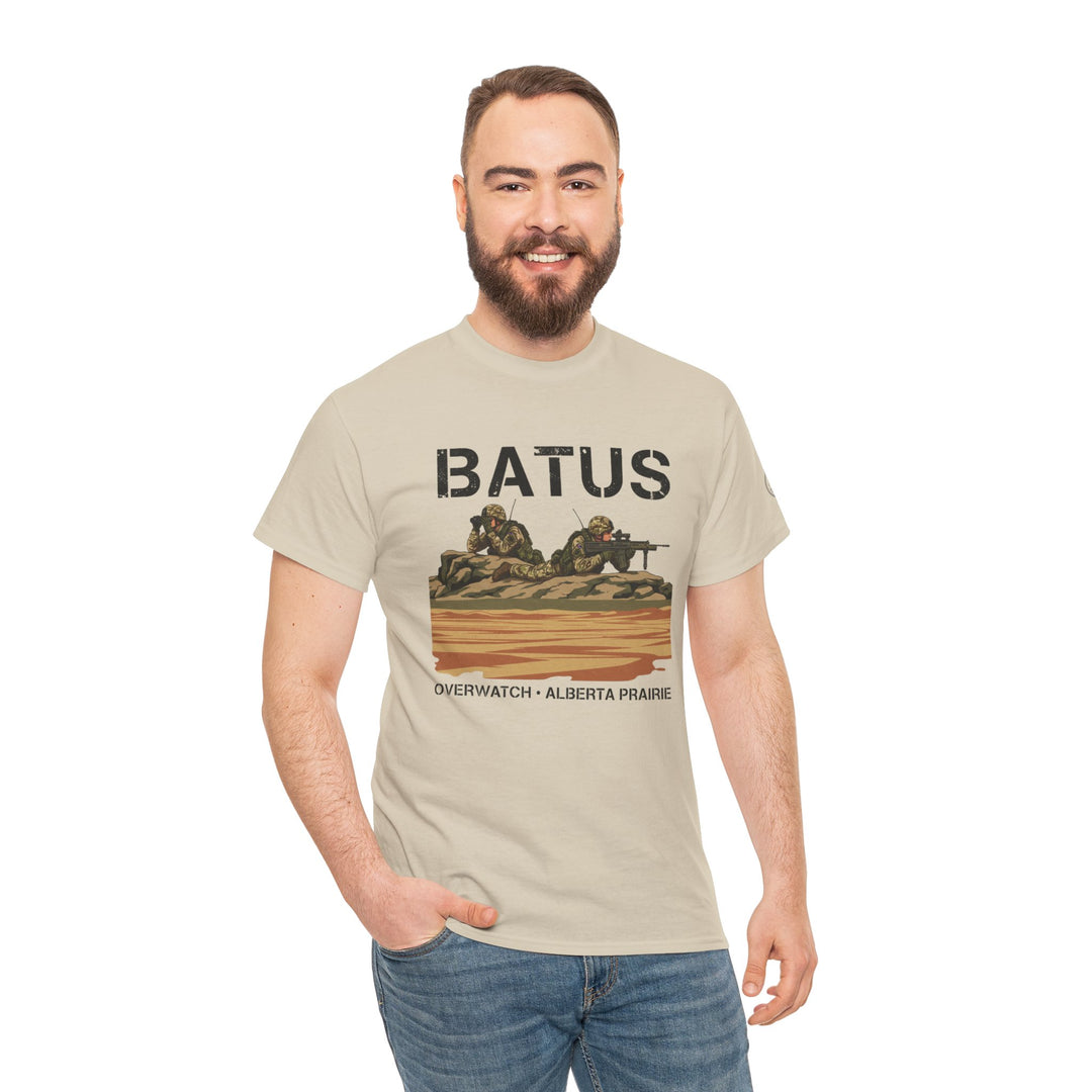 Beige BATUS Alberta Prairie Military Sniper T-shirt by S&amp;W Gallus featuring military sniper graphic, worn with jeans.
