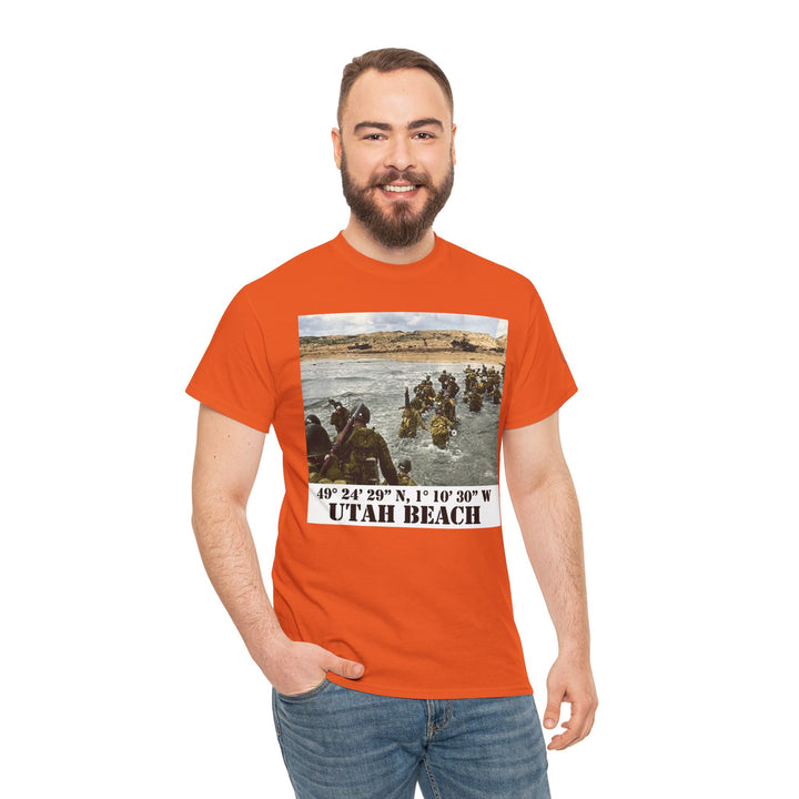 Orange t-shirt by Veteran owned, featuring a Utah Beach D-Day graphic, styled with jeans.