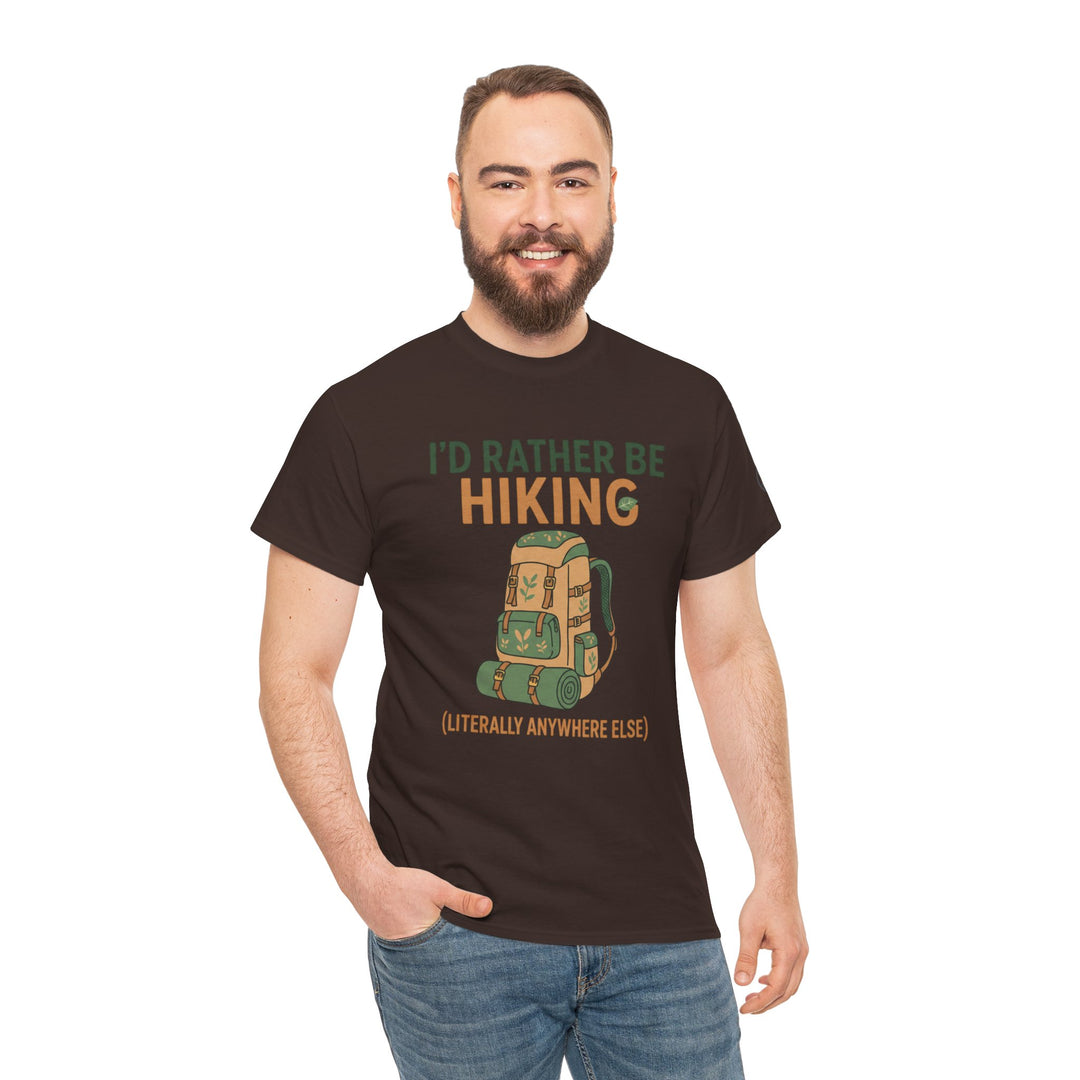 Brown graphic tee by S&amp;W Gallus featuring a hiking-themed print, worn with blue jeans on a white background.