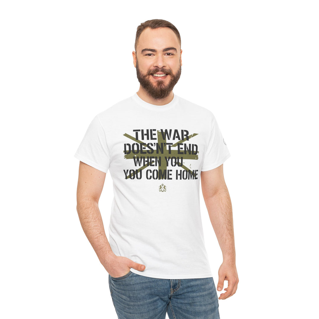 White graphic t-shirt by S&amp;W Gallus with a printed message, worn with blue jeans, on a model smiling in a studio shot.
