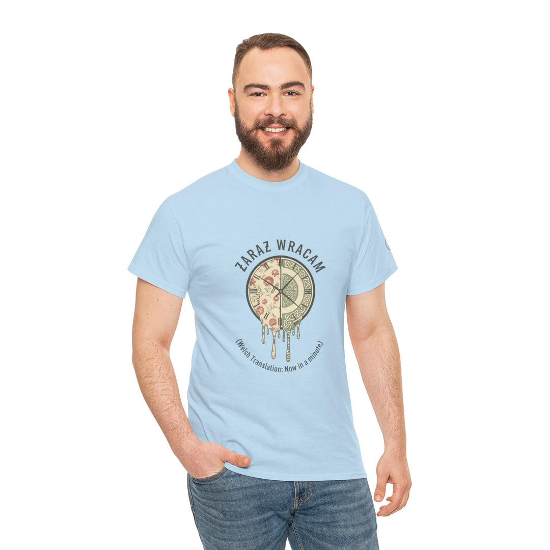 Light blue graphic tee by S&amp;W Gallus featuring a melting clock and pizza graphic, paired with jeans.