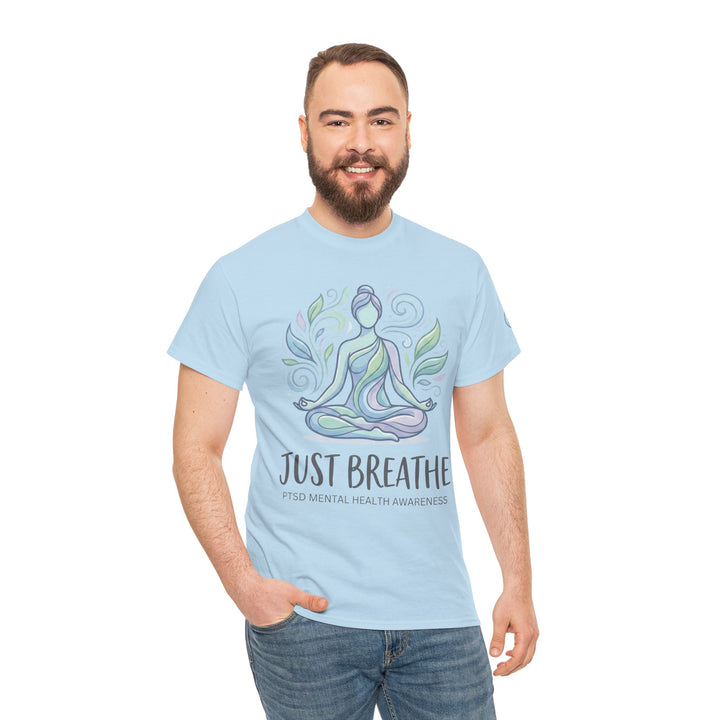 Light blue mental health awareness T-shirt from Veteran Owned, featuring yoga graphic on a model wearing jeans.