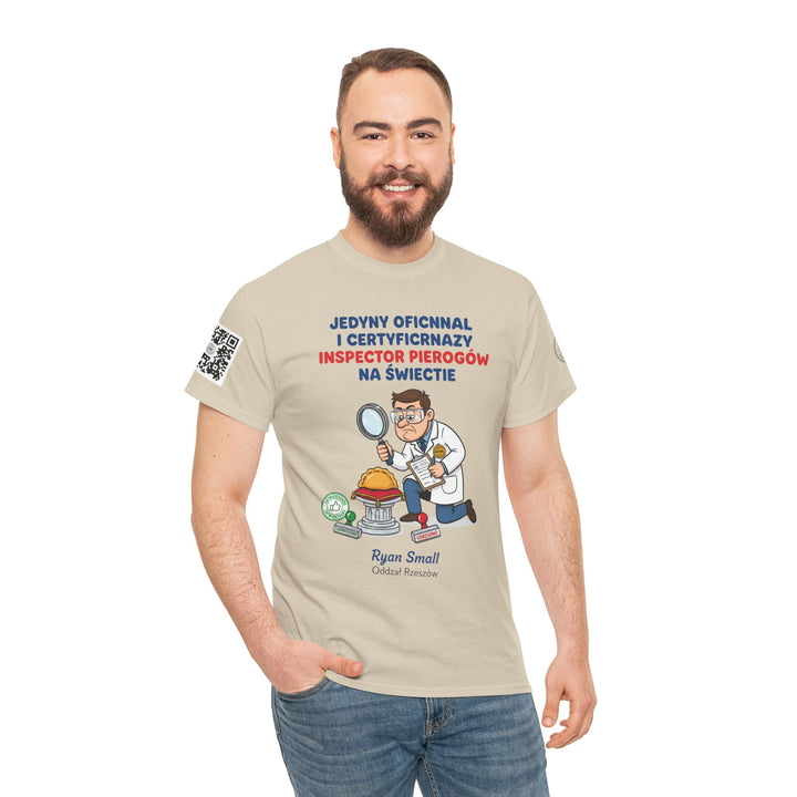 Beige graphic t-shirt by S&amp;W Gallus, featuring a cartoon pierogi inspector design and Polish text, worn with jeans.
