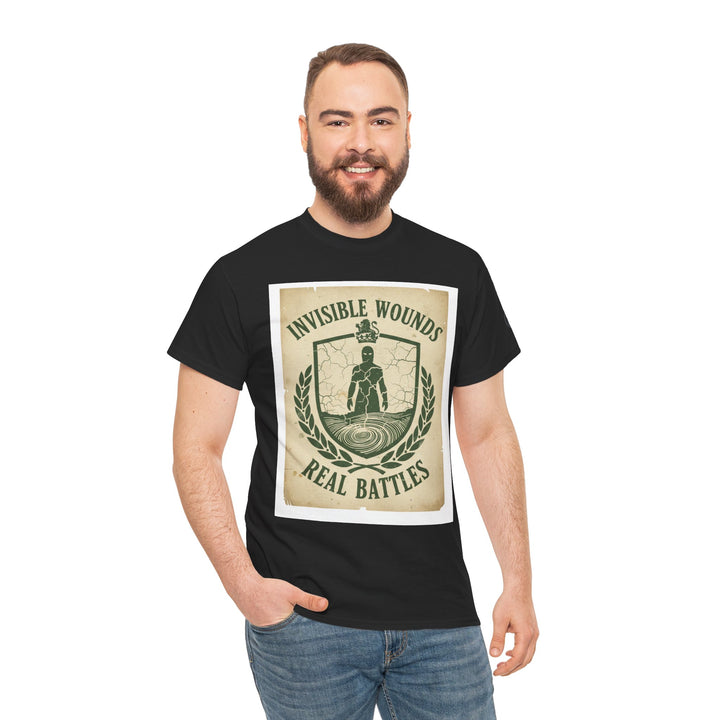 Black t-shirt by S&amp;W Gallus, featuring an "Invisible Wounds Real Battles" design, worn with denim jeans and hand in pocket.