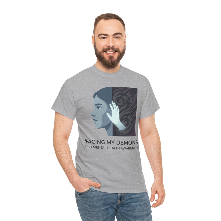 Heather gray t-shirt from Veteran Owned, featuring a graphic design and worn with blue jeans.