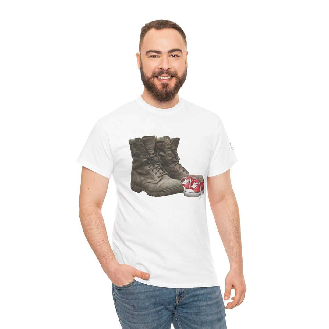 Graphic T-shirt with boots and baby shoes graphic by S&amp;W Gallus, worn with jeans.