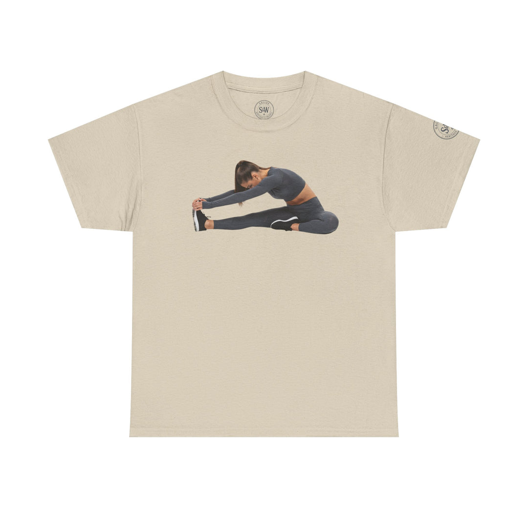 Beige t-shirt by S&amp;W Gallus, featuring a woman stretching her legs on the front.