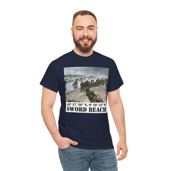 Navy t-shirt by Veteran owned, featuring a "Sword Beach" graphic with coordinates; worn with jeans.
