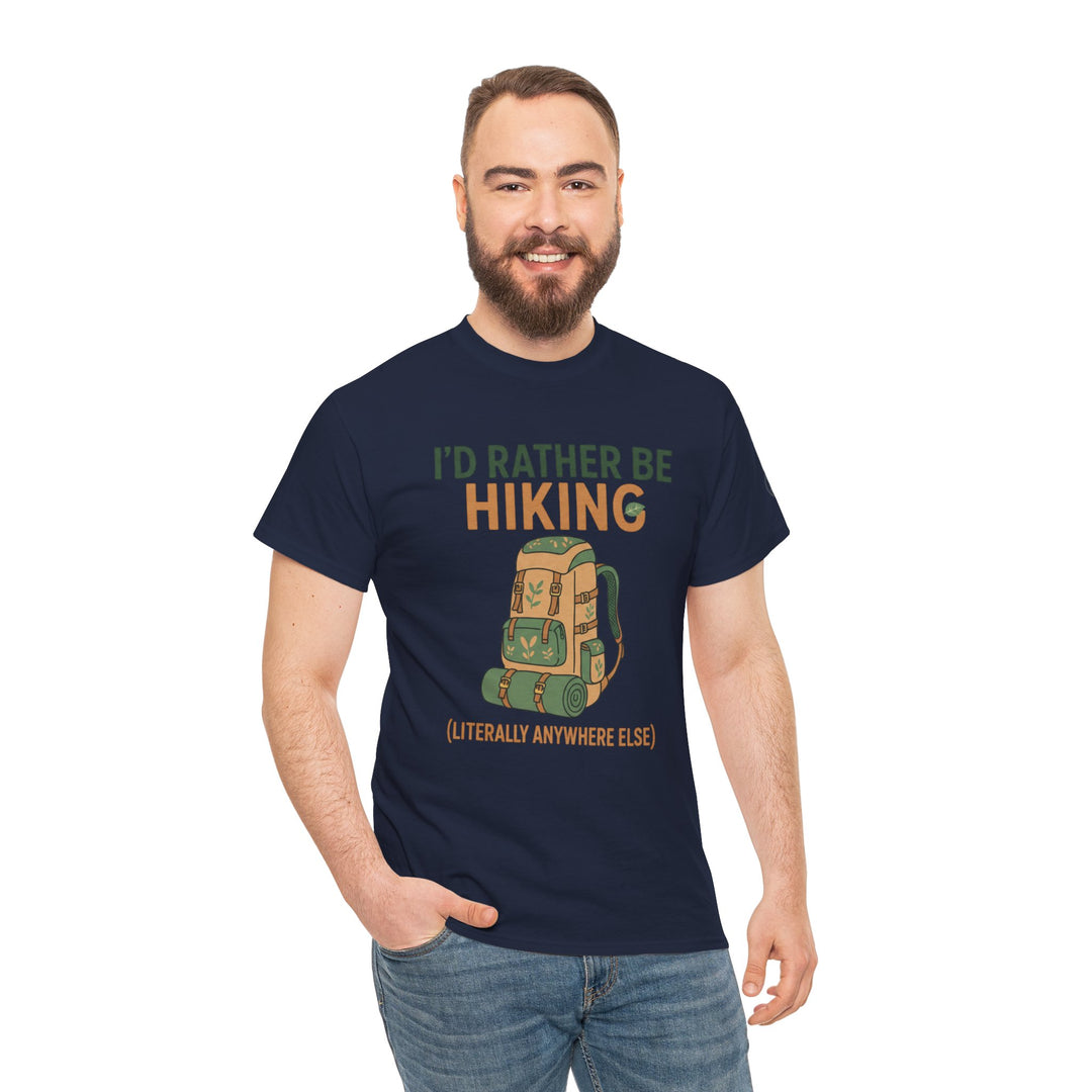 Navy Hiking T-shirt by S&amp;W Gallus featuring an outdoorsy graphic, paired with casual denim jeans on a smiling person.