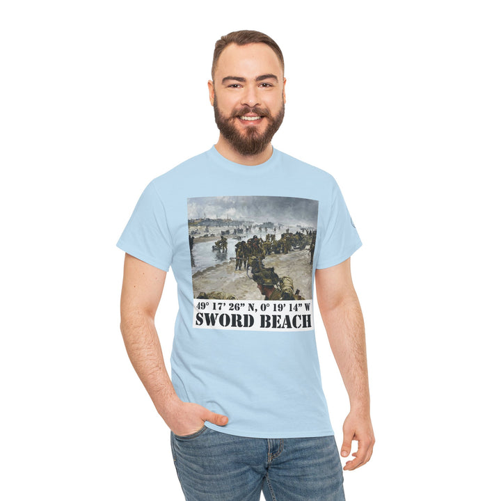 Light blue t-shirt by Veteran owned, featuring a Sword Beach D-Day landing graphic and coordinates, worn with blue jeans.