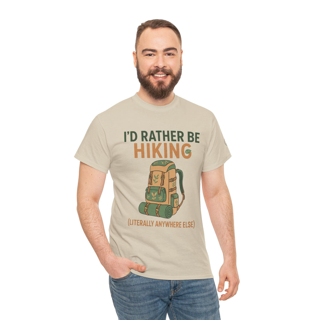 Graphic tee with a hiking backpack design by S&amp;W Gallus, featuring text and worn with blue jeans.