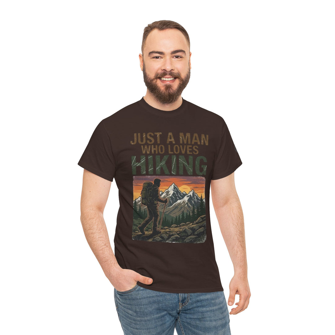Brown t-shirt by Veteran Owned, featuring a hiking themed graphic, worn with jeans.
