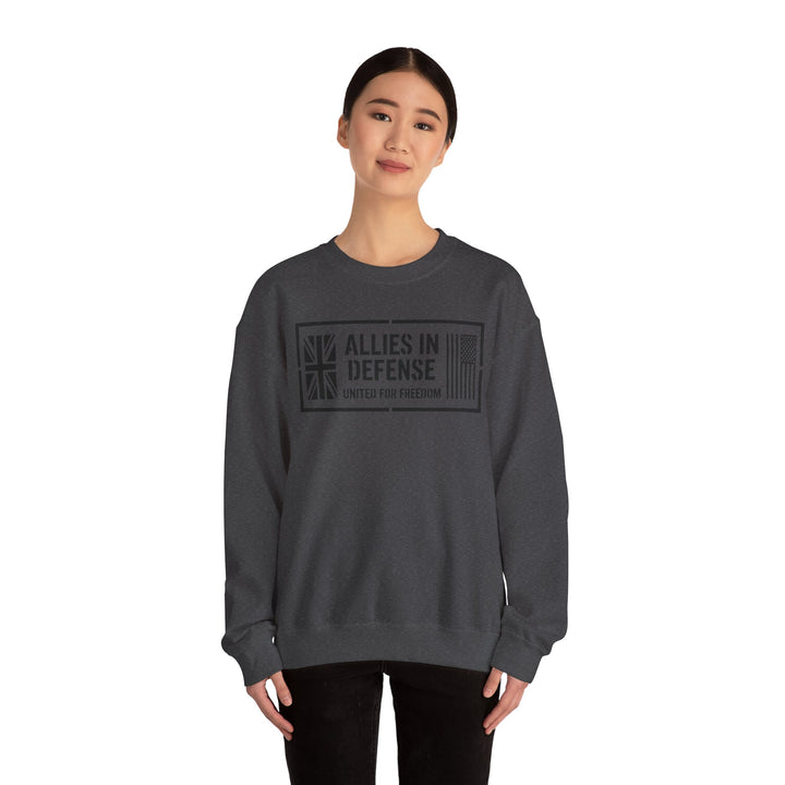 Dark gray crewneck sweatshirt with a graphic by S&amp;W Gallus, featuring United Kingdom and American flag elements.
