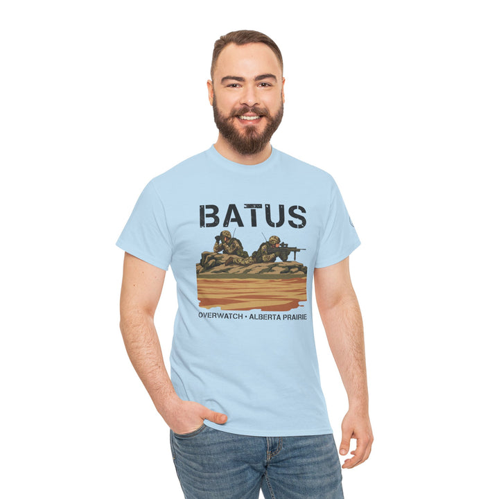 Light blue BATUS military themed t-shirt by S&amp;W Gallus, featuring a landscape graphic and a man wearing jeans.