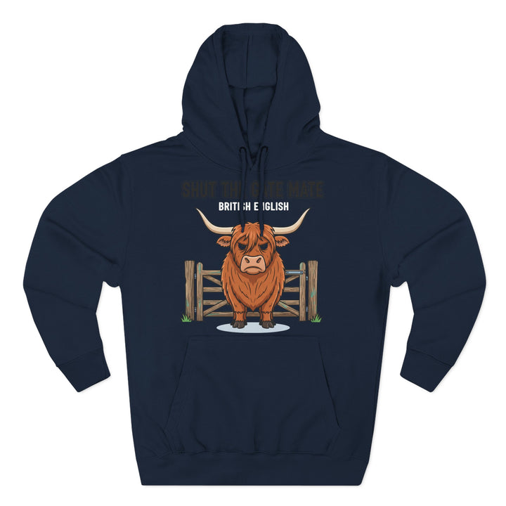 Navy blue hoodie by S&amp;W Gallus, featuring a cartoon Highland cow standing in front of a gate and the text "Shut The Gate Mate."