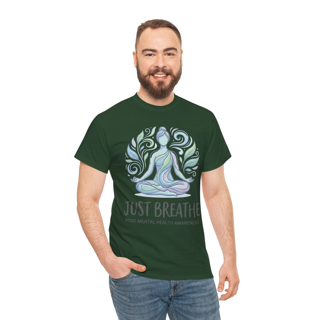 Green t-shirt by Veteran Owned, featuring a meditating figure surrounded by swirling leaves, paired with jeans.