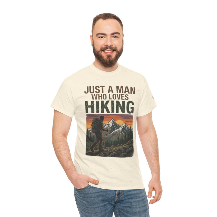 Beige graphic tee shirt by Veteran owned, featuring a hiking design, worn with jeans.