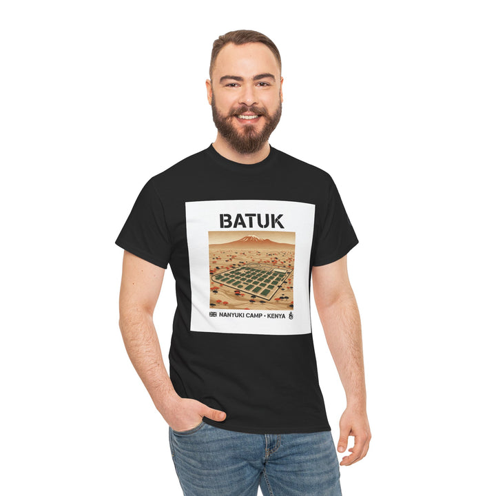 Black graphic T-shirt by S&amp;W Gallus featuring a Nanyuki Camp desert travel graphic on a white square, styled on a model.