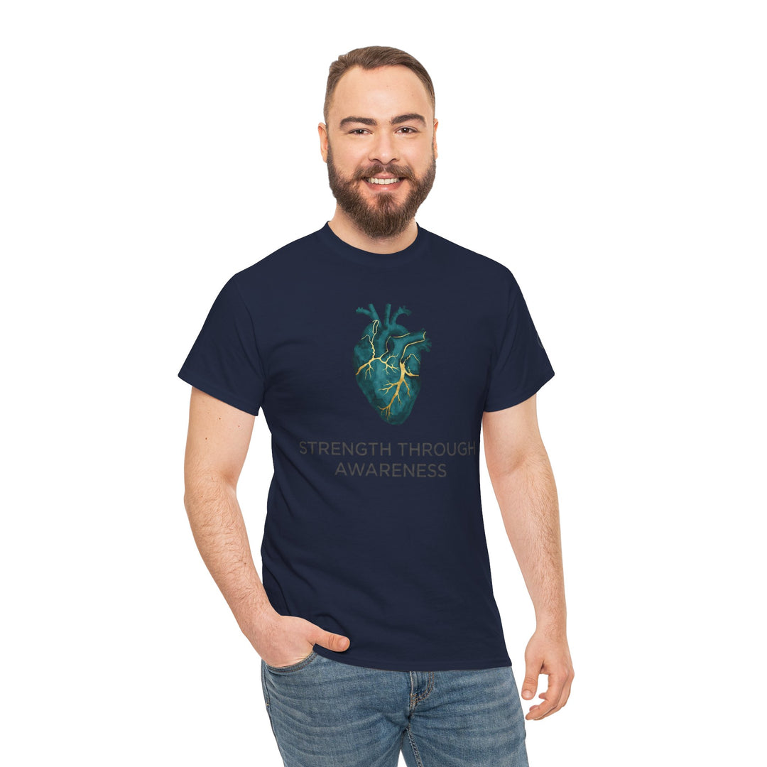 Navy t-shirt with an anatomical heart design by Veteran owned, featuring "Strength Through Awareness" text, worn with jeans.