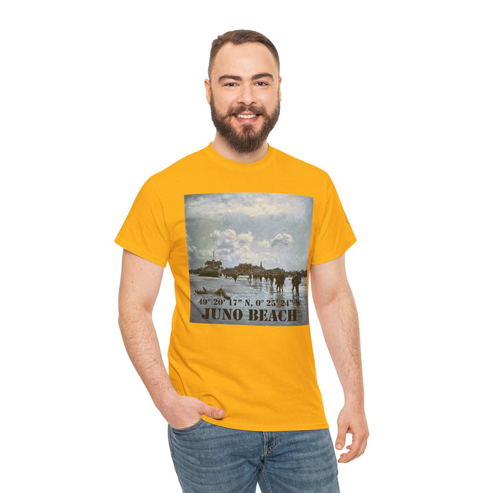 Gold t-shirt with a Juno Beach design by Veteran owned, shown on a smiling man wearing blue jeans.
