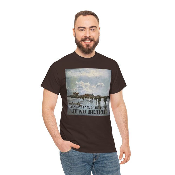 Brown Juno Beach WWII Coordinates T-shirt by Veteran owned, featuring a painting of the beach and a coordinates caption, worn with blue jeans.