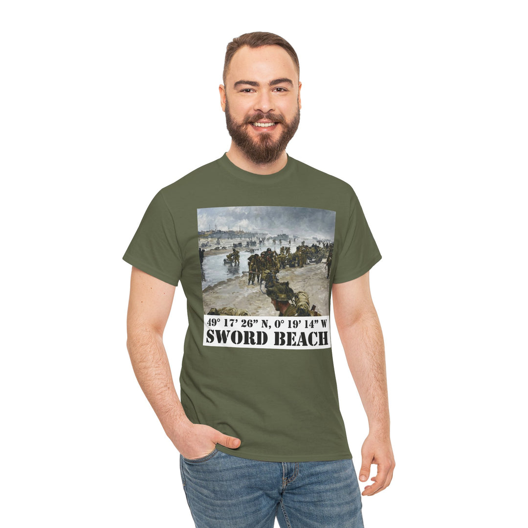 Olive green t-shirt with "Sword Beach" image by Veteran owned, shown on a smiling man wearing jeans.