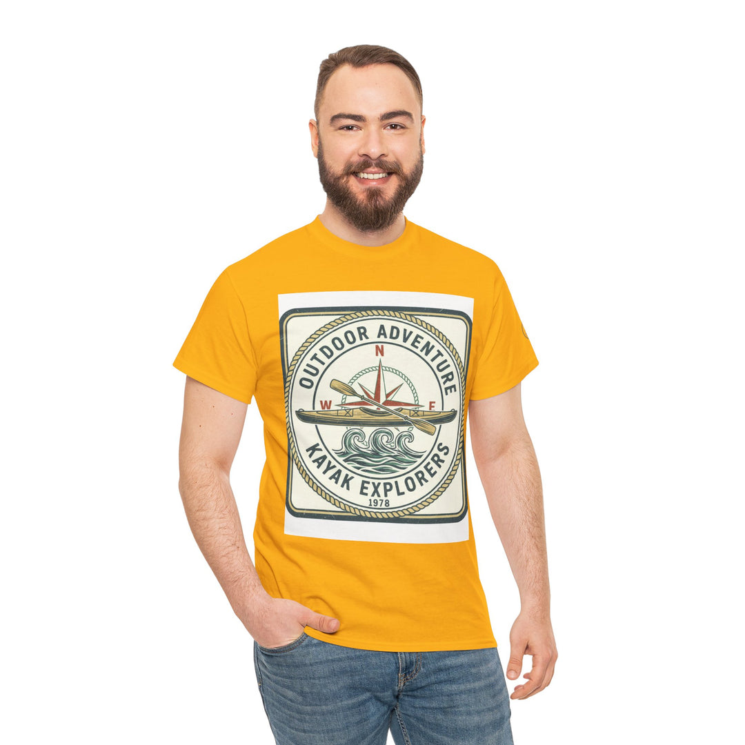 Mustard yellow t-shirt by S&amp;W Gallus, featuring a compass and kayak graphic, worn with jeans.