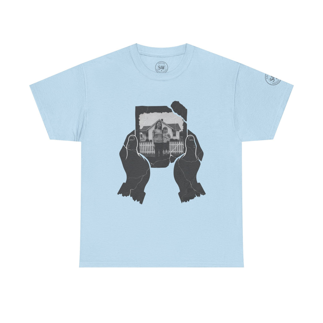 Light blue t-shirt by S&amp;W Gallus with a graphic of two hands holding a torn black and white photo.
