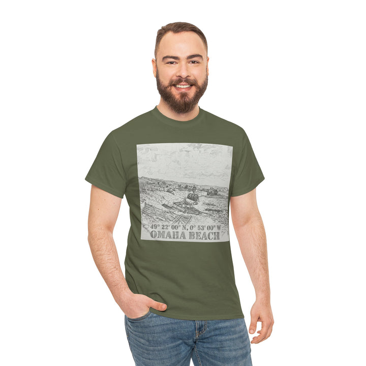 Olive green t-shirt by Veteran Owned, featuring Omaha Beach coordinates graphic, paired with jeans.