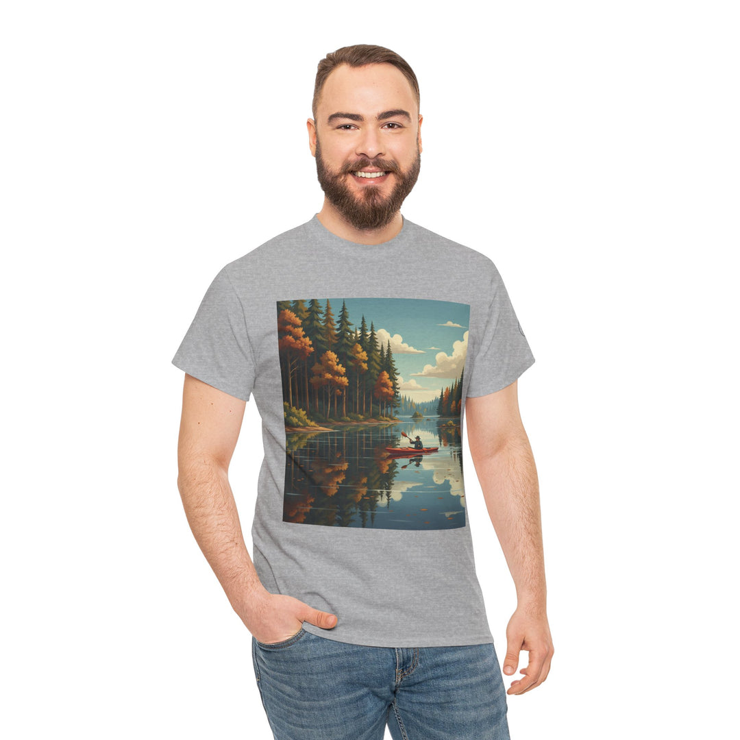 Gray t-shirt with a canoe lake graphic by S&amp;W Gallus, worn with jeans by a smiling man.