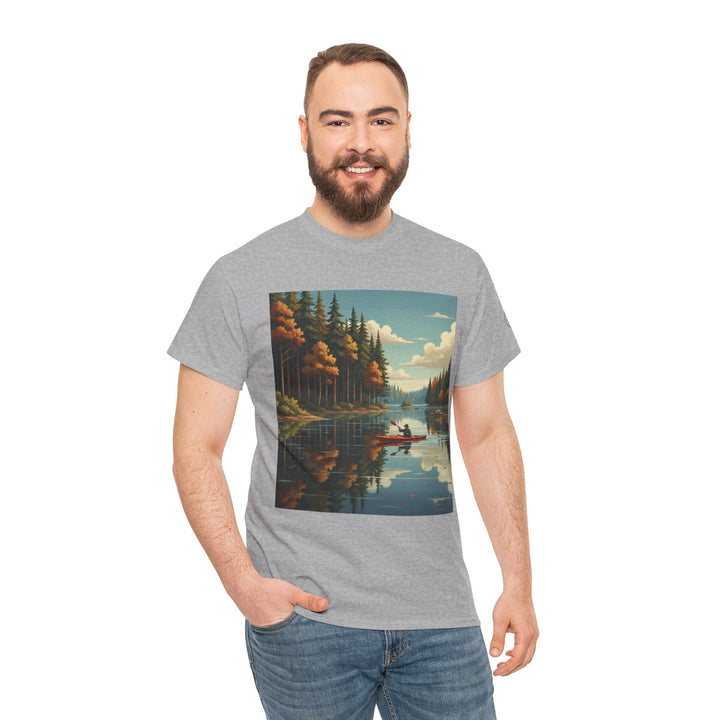 Gray t-shirt with a canoe lake graphic by S&amp;W Gallus, worn with jeans by a smiling man.