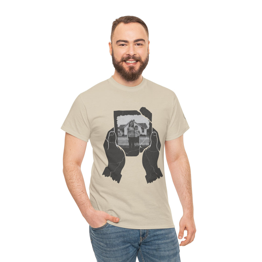 Beige T-shirt by S&amp;W Gallus with black and white graphic design, styled with blue jeans and a smiling model.
