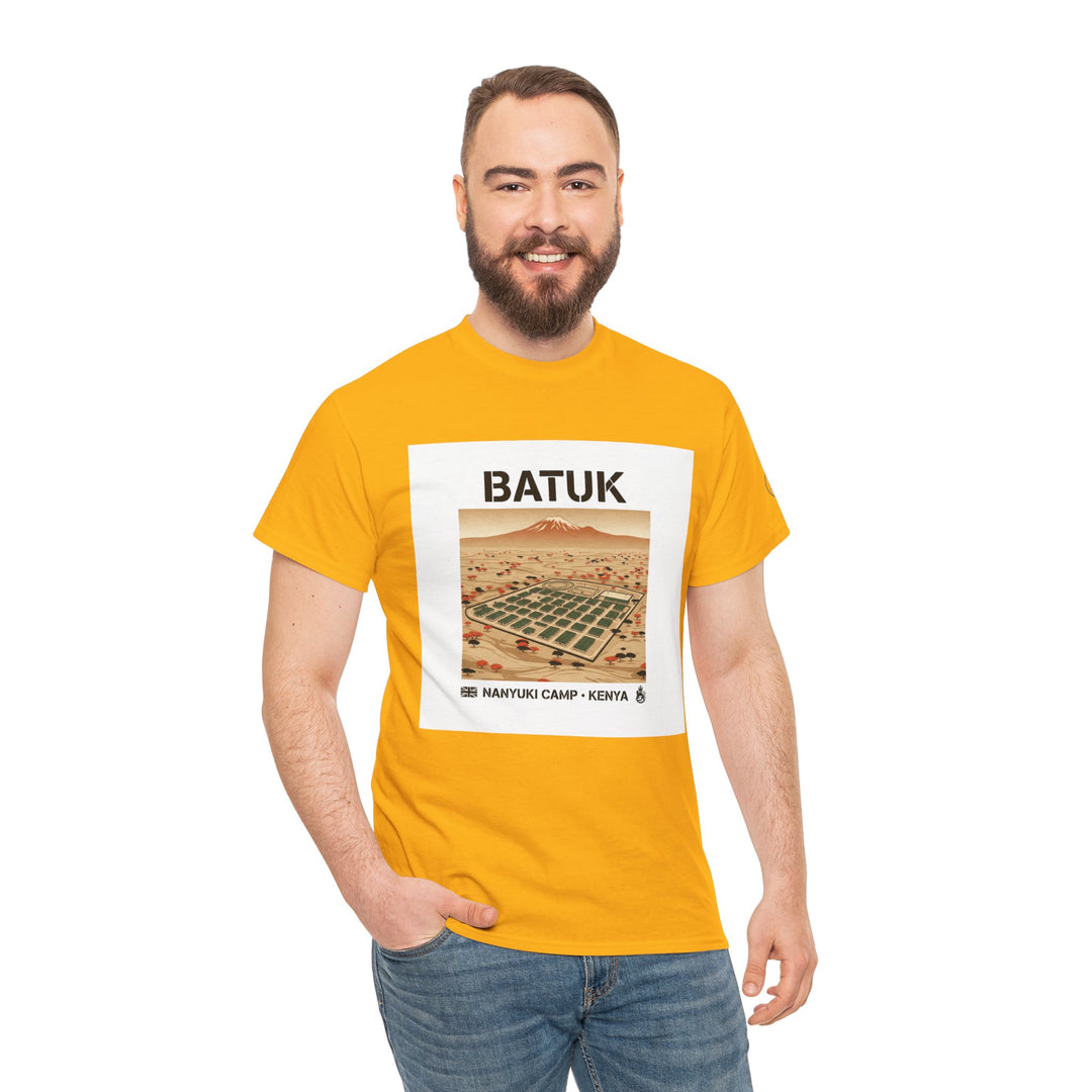 Yellow graphic t-shirt by S&amp;W Gallus featuring a desert landscape design, paired with casual jeans on a smiling man.
