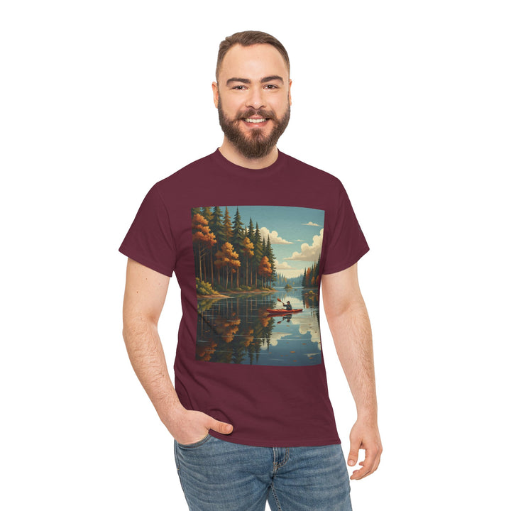 Maroon t-shirt with canoe lake graphic by S&amp;W Gallus, shown on smiling bearded man wearing jeans.