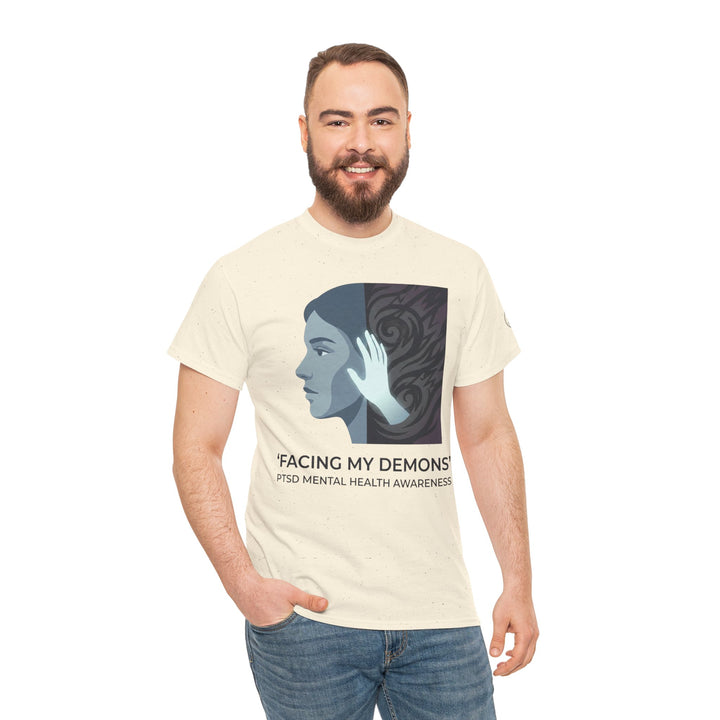Beige graphic tee by Veteran owned, featuring a mental health design, worn with jeans.