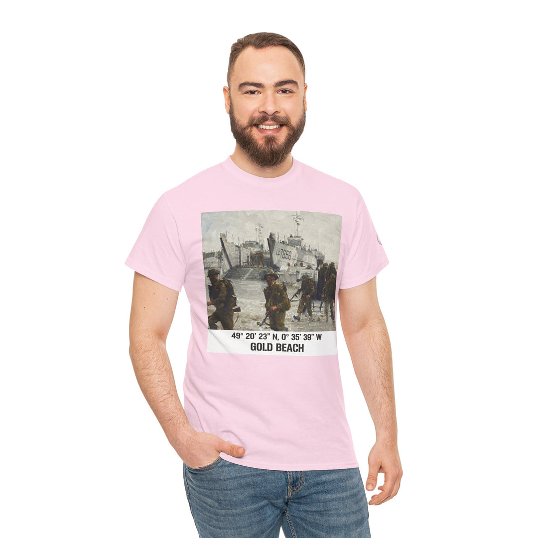 Pink t-shirt with a historical beach graphic by Veteran owned, paired with blue jeans, on a smiling man.