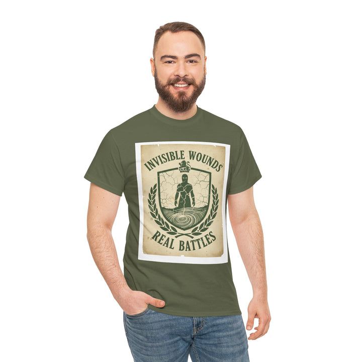 Olive green t-shirt by S&amp;W Gallus featuring a graphic design with "Invisible Wounds Real Battles" text, worn with jeans.