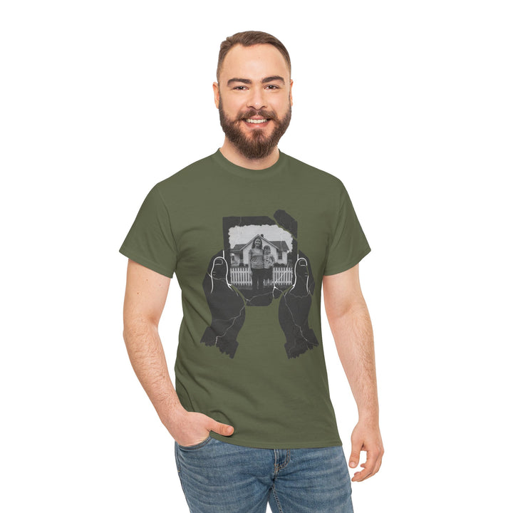 Olive green tee by S&amp;W Gallus with hands holding a cracked photo print, worn with jeans.