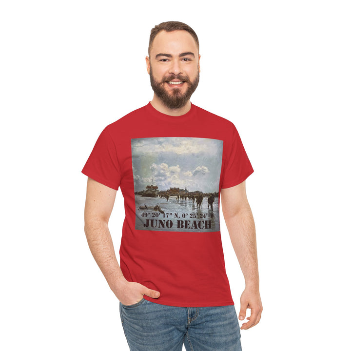 Red t-shirt with Juno Beach coordinates by Veteran owned, featuring D-Day landing art, styled with a smiling man and blue jeans.
