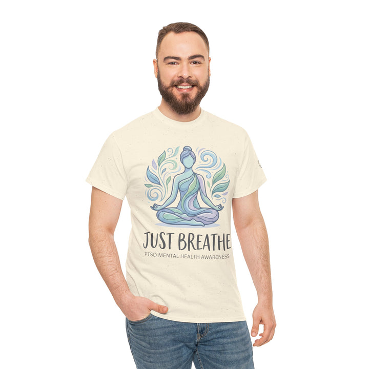 Just Breathe T-shirt by Veteran owned, featuring a yoga illustration in calming hues, paired with casual jeans.