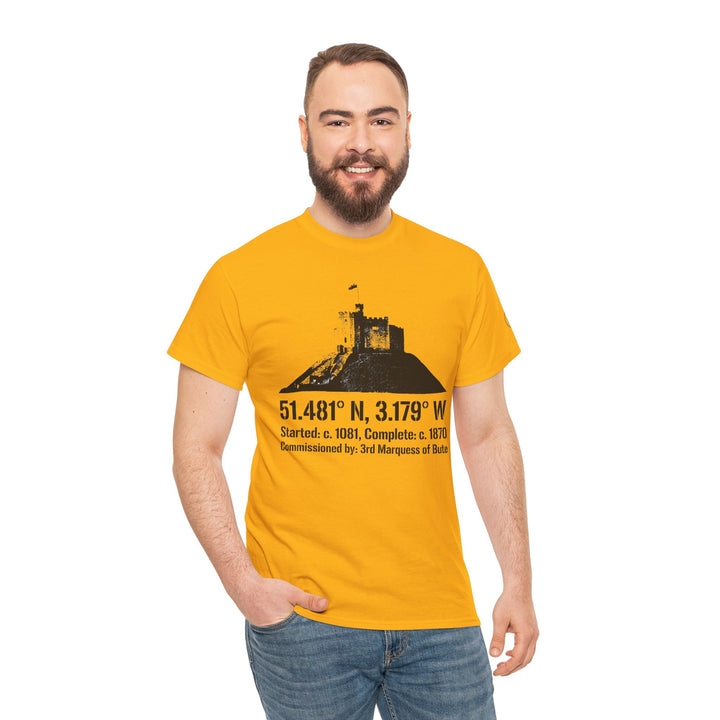 Mustard yellow t-shirt by S&amp;W Gallus, featuring a black graphic of Cardiff Castle and its coordinates. The model wears jeans.
