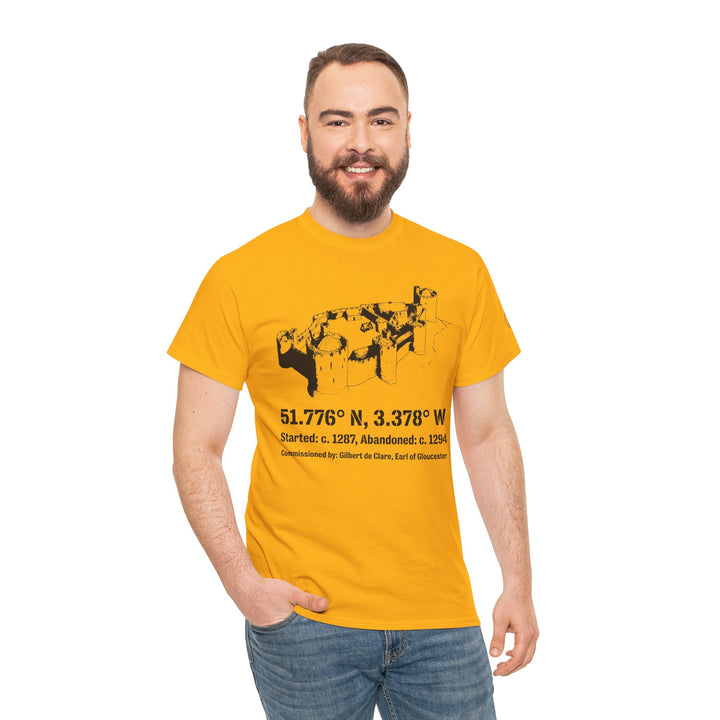 Yellow Morlais Castle T-shirt by S&amp;W Gallus, featuring a black castle graphic and coordinates, styled with jeans.