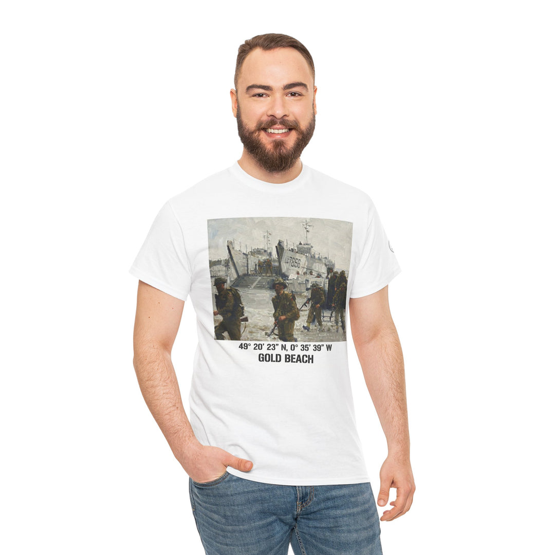 White t-shirt by Veteran owned, featuring a Gold Beach Normandy landing graphic and coordinates. The model wears jeans and has a beard.