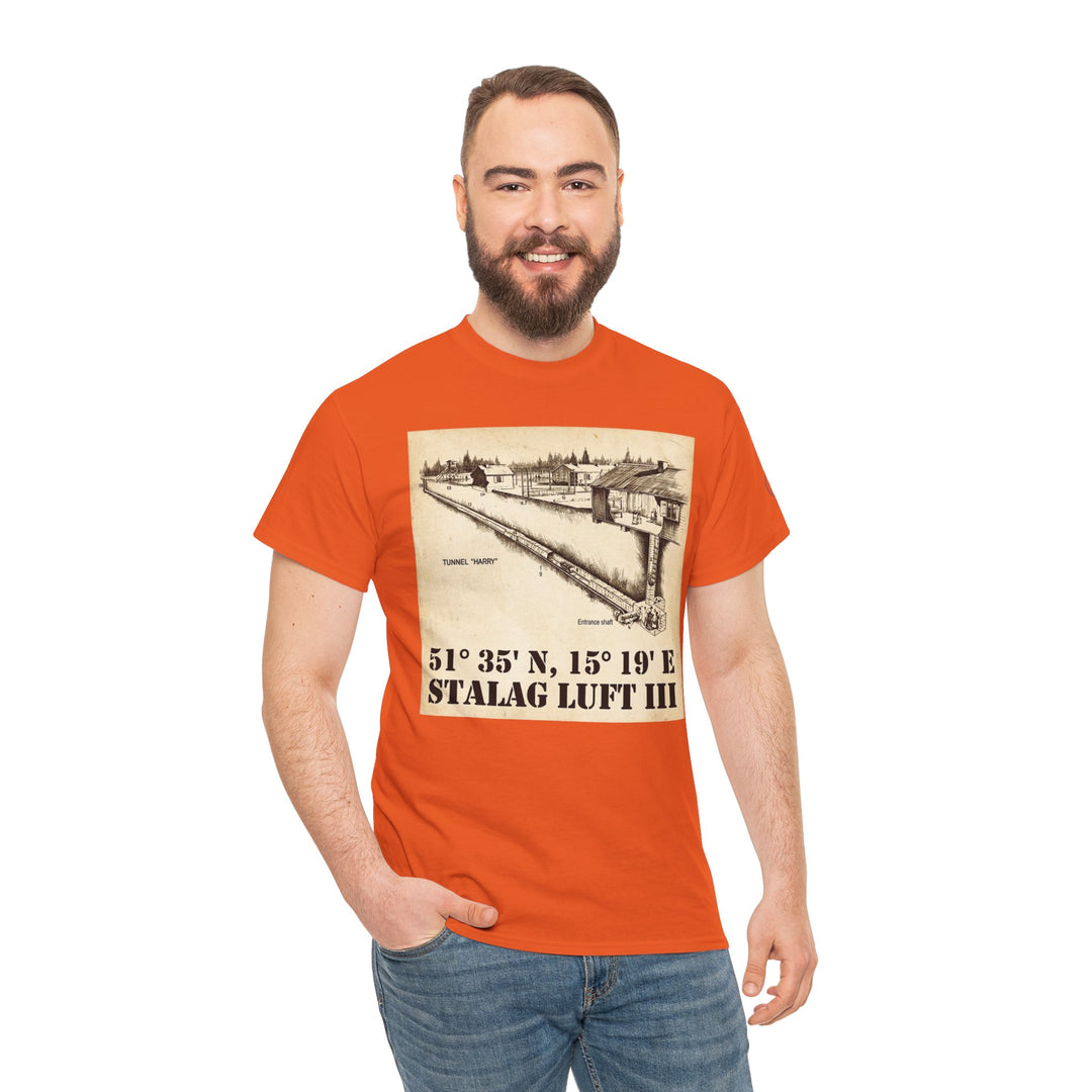 Orange T-shirt with Stalag Luft III coordinates graphic by Veteran owned, paired with blue jeans on a smiling model.
